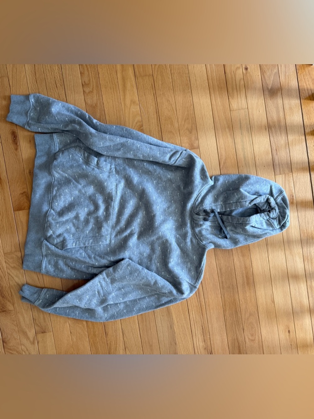 Nike Gray Hoodie with White Swoosh Pattern